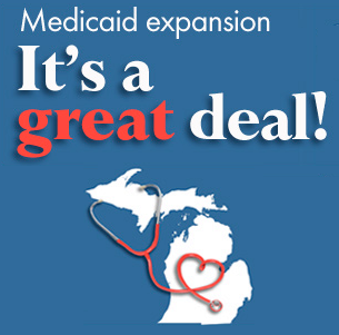 Michigan Gov. Rick Snyder signs Medicaid expansion into law