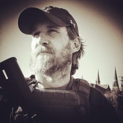 UPDATED – VIDEO: White Michigan man on “open carry walk” prompts school lockdown, taunts cops, and lives